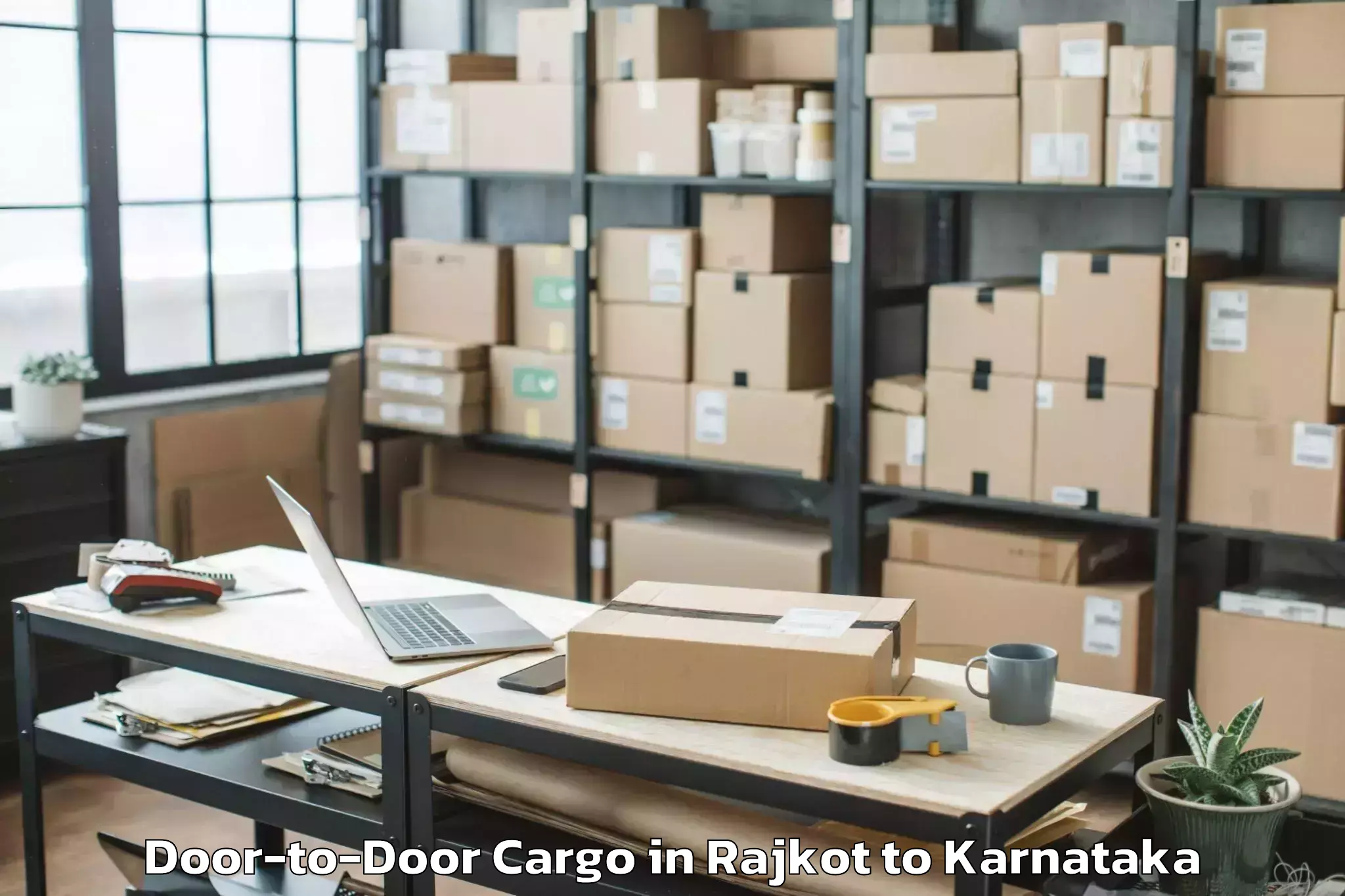 Easy Rajkot to Nyamathi Door To Door Cargo Booking